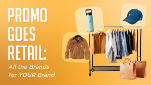 A promotional image featuring a wardrobe rack with various clothing items, a blue cap, a mint-green water bottle, and shopping bags on a yellow background. Text reads "Promo Goes Retail: All the Brands for YOUR Brand.