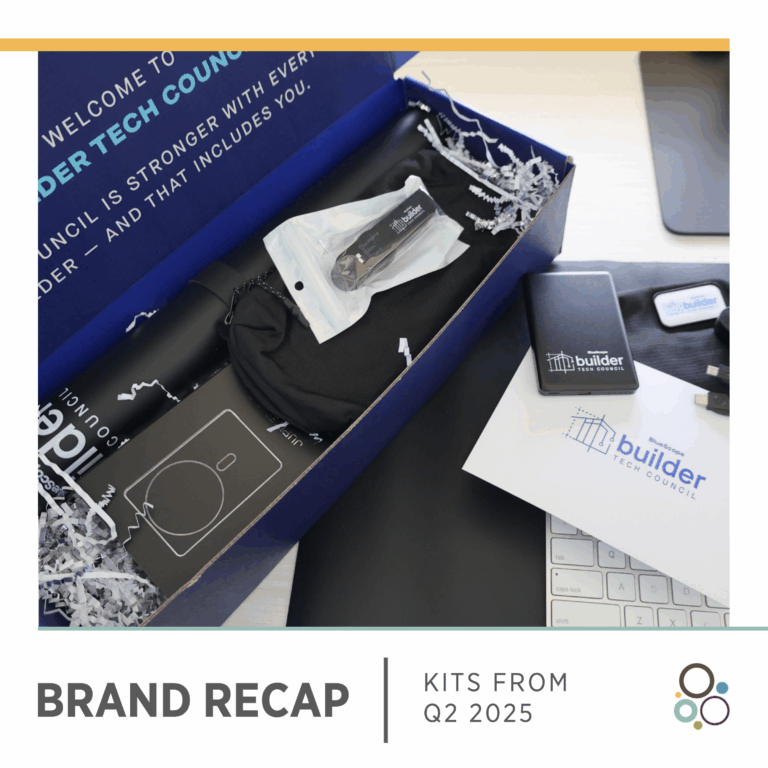 Open branded box containing a water bottle, black pouch with a USB drive, sticker, and a tech council notebook, next to a keyboard and pen. Text: "BRAND RECAP, KITS FROM Q2 2025.